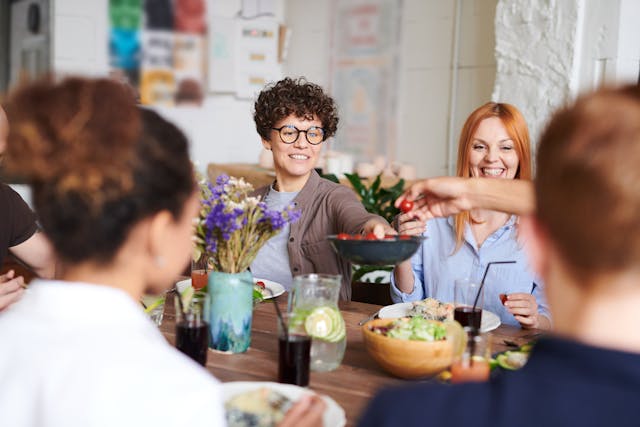 people sharing food at a restaurant